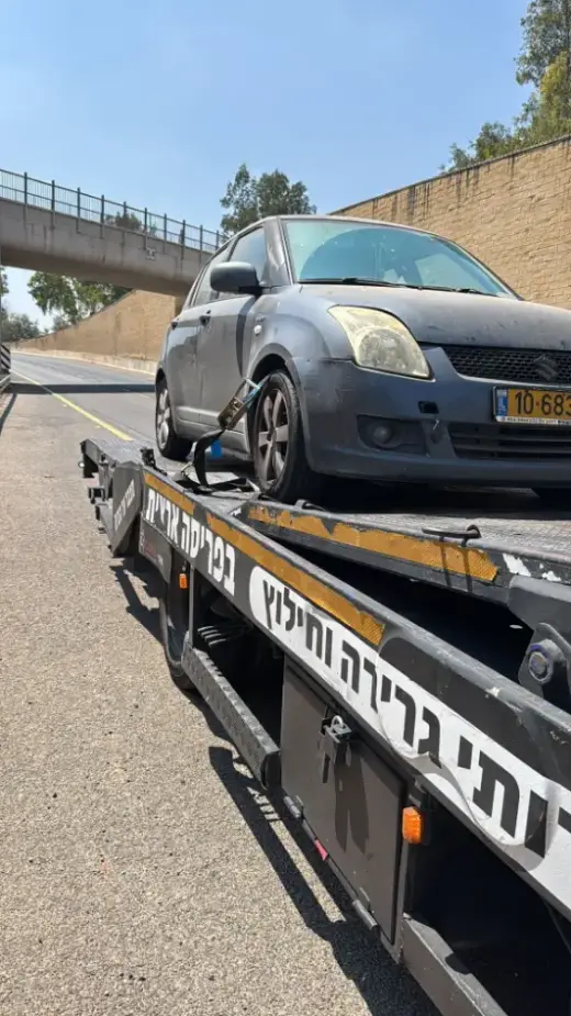 רכב פרטי על גרר ק.מ